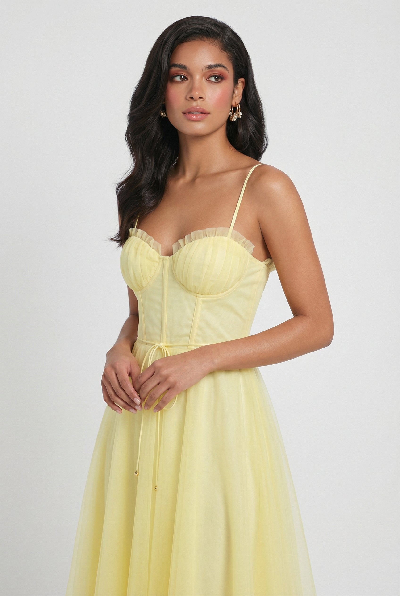 Flowy yellow midi dress by Lumina Wear featuring an elegant, lightweight design perfect for summer or special occasions.