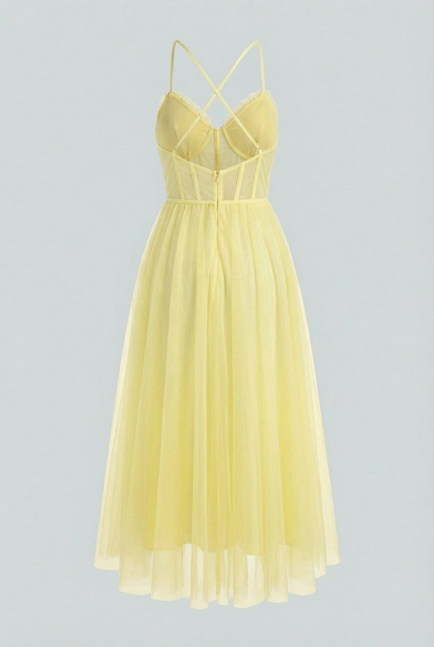 Flowy yellow midi dress from Lumina Wear featuring an elegant design, perfect for stylish occasions.