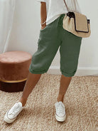 Black Sophia Lumina Wear lightweight breathable cotton shorts with elastic waist, shown on a model.