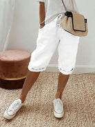 Black Sophia lightweight breathable cotton shorts with elastic waist by Lumina Wear, shown on a model.
