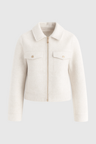 Lumina Wear Sophia women's cropped zip-up jacket with functional pockets, white modern outerwear for stylish comfort.