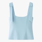 Lumina Wear Sophia playful bow-detail crop top with zipper closure in blue, designed for women's fashion, size XS.