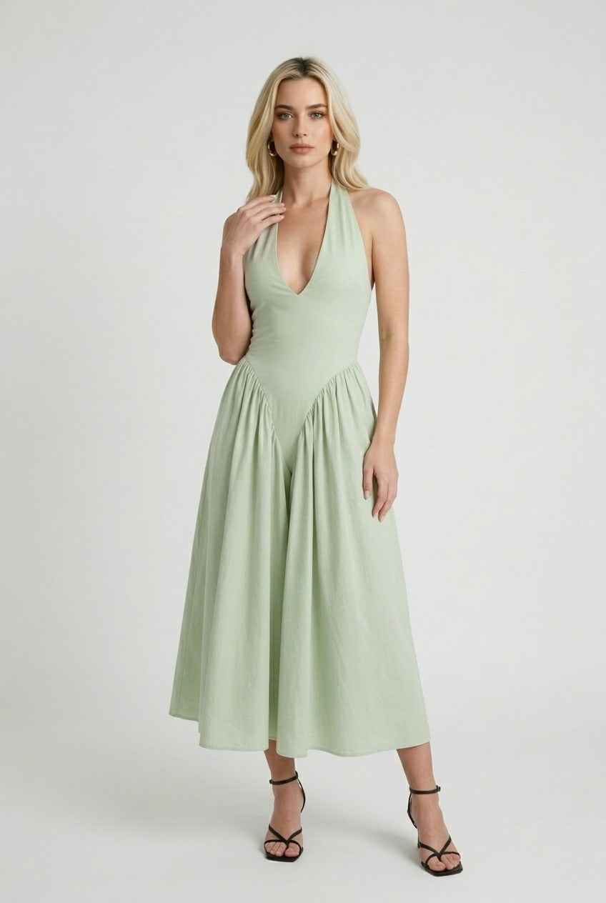 Sophia Lumina green midi dress for women featuring a sculpted fit and flattering silhouette, showcased on a model.
