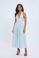 Light blue Sophia midi dress by Lumina Wear, featuring an elegant fit and soft fabric, displayed on a mannequin.