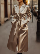 Sophia trench coat in refined champagne satin by Lumina Vancouver, shown in a stylish, elegant coat with a smooth satin finish.
