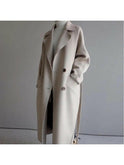 Beige Sophie long coat for women by Lumina Wear, featuring a stylish, elegant design with a tailored fit.