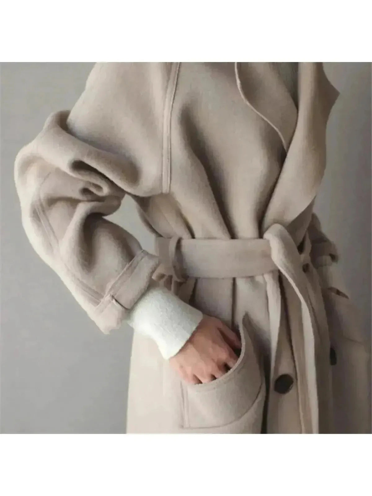 Beige Sophie long coat for women by Lumina Vancouver, featuring a tailored, elegant design with a classic collar and button closure.