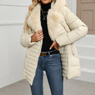 Black Sophie Lumina Wear longline puffer coat with faux-fur collar, women’s winter jacket, slim fit and stylish design.