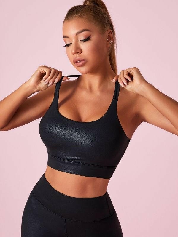 Black Lumina Vancouver matte leather I-shaped sports bra with sleek, supportive design, shown in XS size.