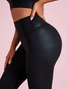 Black Lumina Vancouver Sports Bra in matte leather, I-shaped design, XS size, ideal for active wear and support.