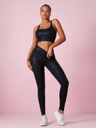 Black Lumina Vancouver I-shaped sports bra with matte leather finish, shown in size XS/S.