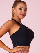 Black Lumina Vancouver sports bra with Roman knot halter design and beautify back detail for active wear.
