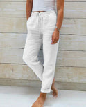Light beige linen pants for women by Lumina Wear, featuring a modern fit and lightweight fabric, shown in XS size.