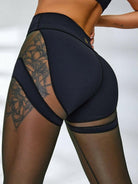 Black Lumina Vancouver sheer mesh sports bra with supportive design and breathable fabric for active wear.