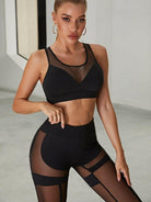 Black mesh sports bra from Lumina Vancouver featuring a unique, sexy design for activewear and workout comfort.