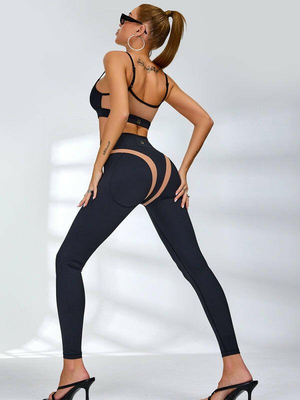 Black Lumina Vancouver mesh sports bra with sheer, breathable design and unique, sexy style for active wear.