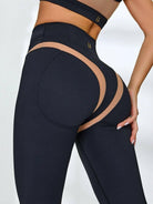 Black Lumina Vancouver mesh sports bra with sheer, breathable design and unique pattern, ideal for activewear and workouts.