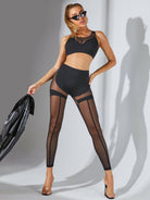 Black mesh sports bras from Lumina Vancouver, featuring a stylish design and matching bonus jacket for activewear.