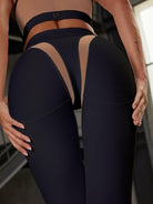 Black Lumina Vancouver mesh sports bra with unique sexy design, featuring breathable fabric and supportive fit.