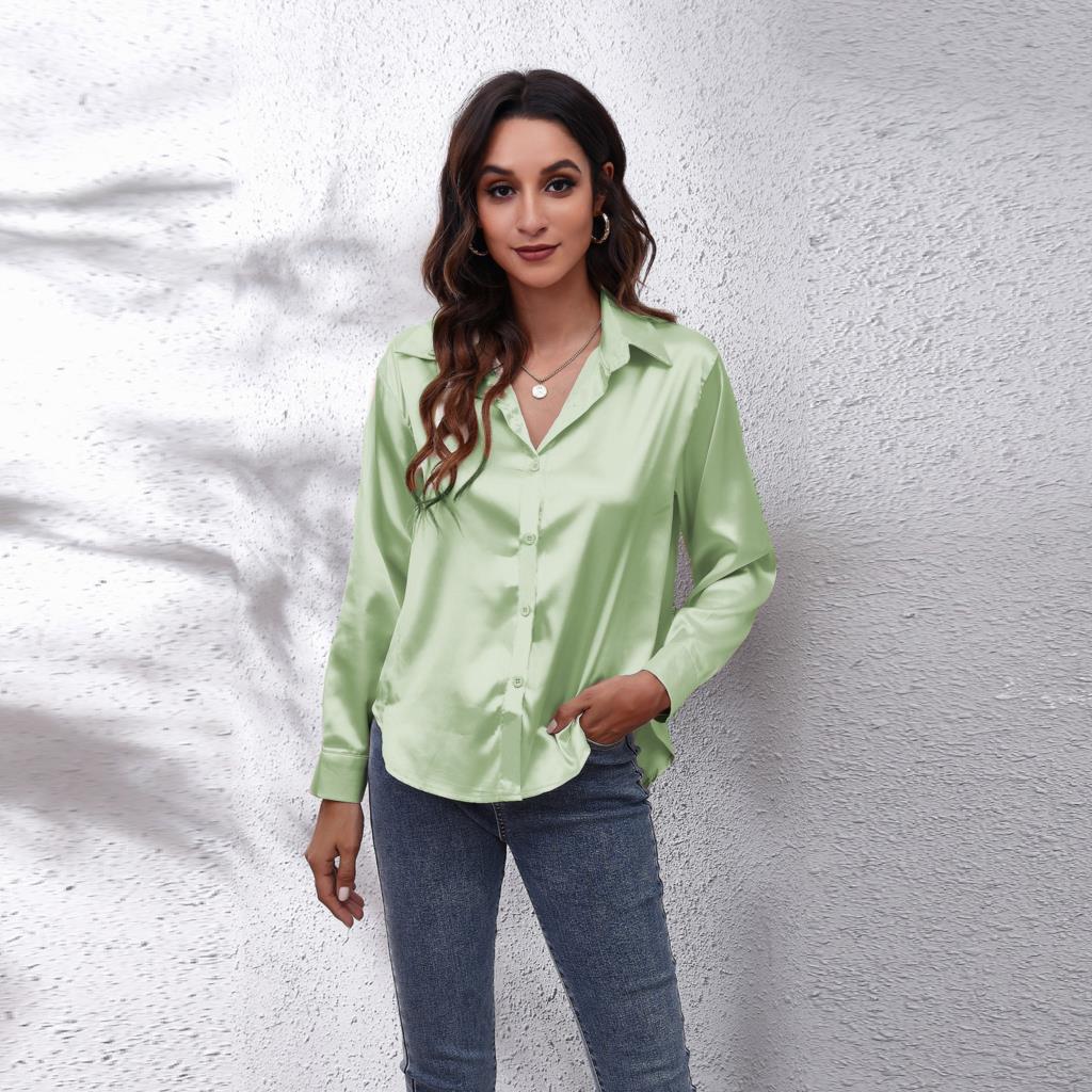 Blue Sydney relaxed fit satin blouse by Lumina Wear, showcasing smooth fabric and elegant design for women's blouses.