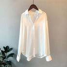 Beige Taylor Lumina relaxed fit blouse with button details, featuring a stylish and comfortable design for casual and office wear.