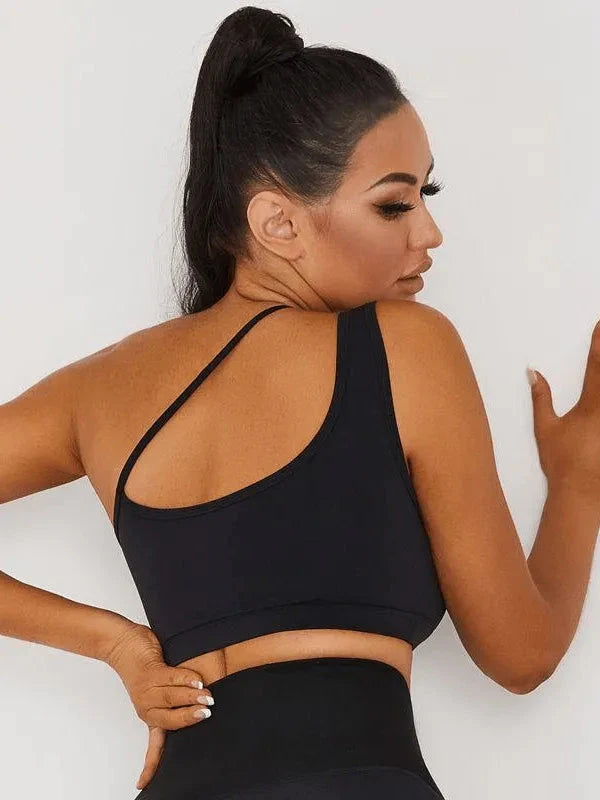 Black Lumina Vancouver medium-impact sports bra with a snug fit, designed for comfortable support during workouts.