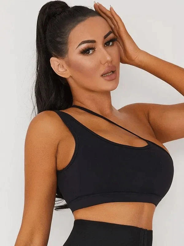 Black Lumina Vancouver medium-impact sports bra with a snug fit, designed for support during workouts and active sports.