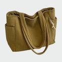 Lumina Wear Tilda minimalist tote bag in green with spacious interior, stylish handbag for everyday use.