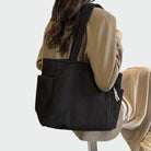 Lumina Wear Tilda chic minimalist tote bag with spacious interior, green color, stylish design, perfect for everyday use.