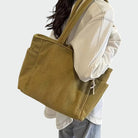 Lumina Wear Tilda chic minimalist tote bag in green with spacious interior, stylish handbag for everyday use.