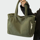 Lumina Wear Tilda minimalist tote bag in green with spacious interior, stylish design, perfect for everyday use.