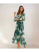 Lumina Vancouver Tilly Printed V-Neck Dress in emerald green, lightweight fabric with floral pattern, short sleeves, and a flattering fit.
