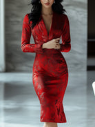 Red printed satin gown by Lumina Wear featuring elegant design, perfect for formal occasions and evening events.