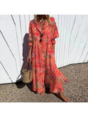 Bright multicolor Trishia dress by Lumina Wear featuring vibrant floral patterns and a flowing silhouette.