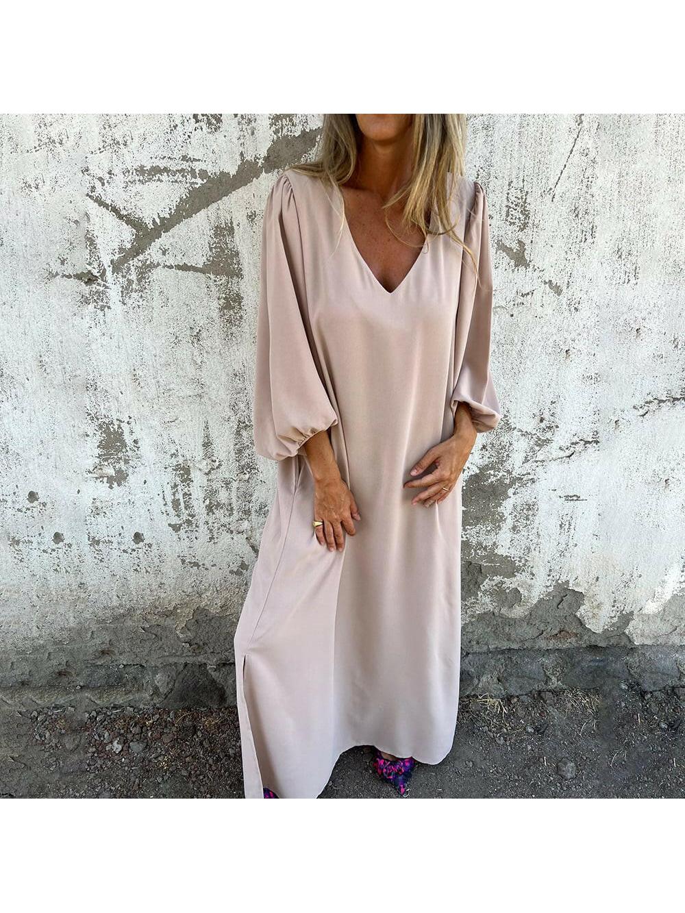Red-orange Trixy™ maxi dress by Lumina Vancouver, flowing design, perfect for summer or casual occasions.
