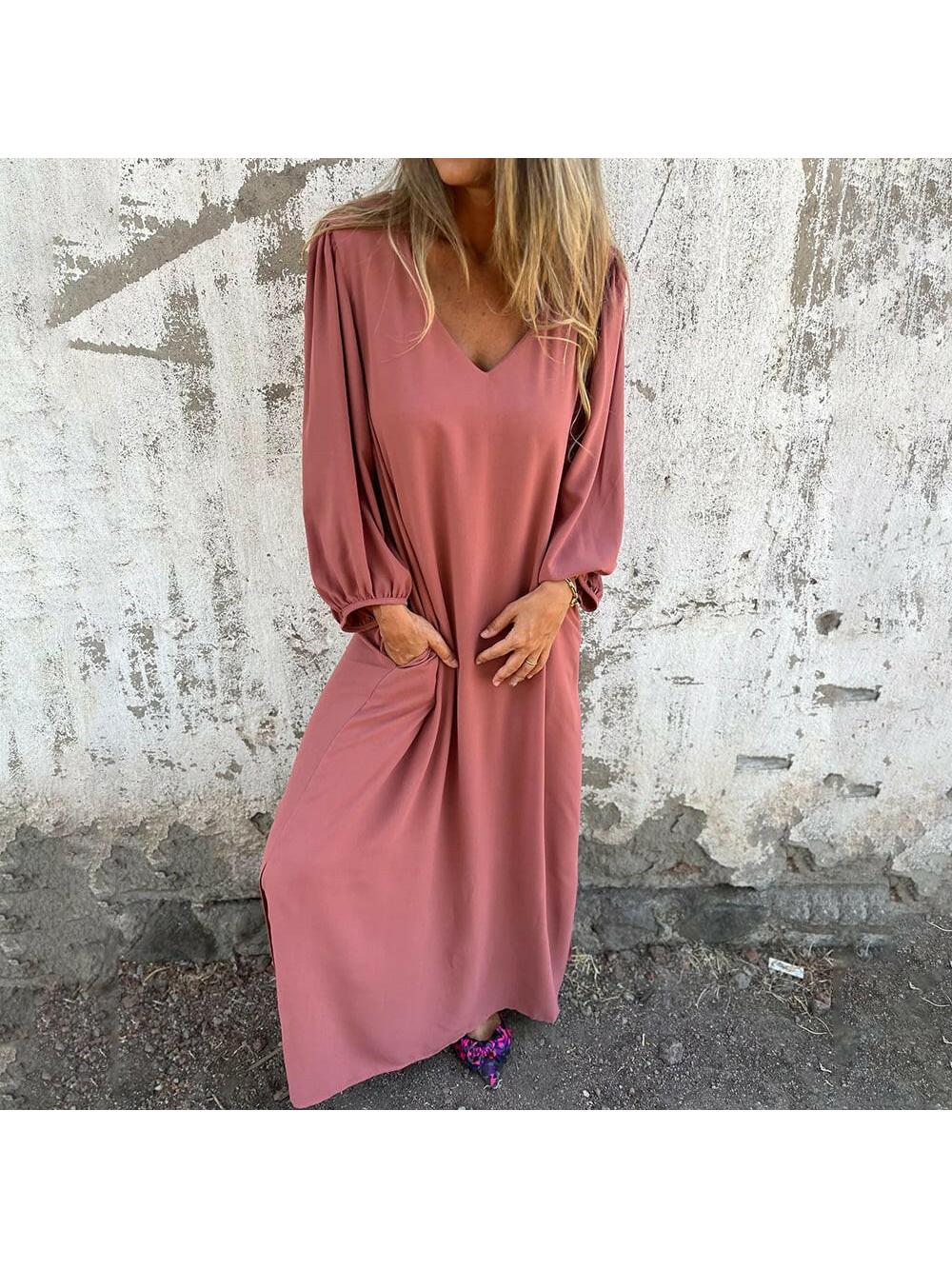 Red and orange Trixy™ Maxi Dress by Lumina Vancouver with flowing fabric and stylish design, perfect for elegant occasions.