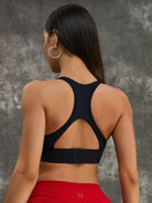 Black Lumina Vancouver Twist Hollow Out Sports Bra with stylish cutout design, perfect for active wear and workouts.