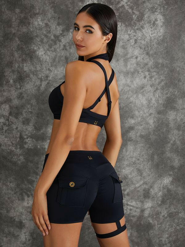 Black Lumina Vancouver cut-out sports bra with stylish design and breathable fabric, ideal for workout and active wear.