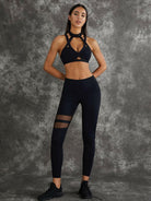 Black Lumina Vancouver cut-out sports bra featuring stylish open back design for activewear and workout comfort.