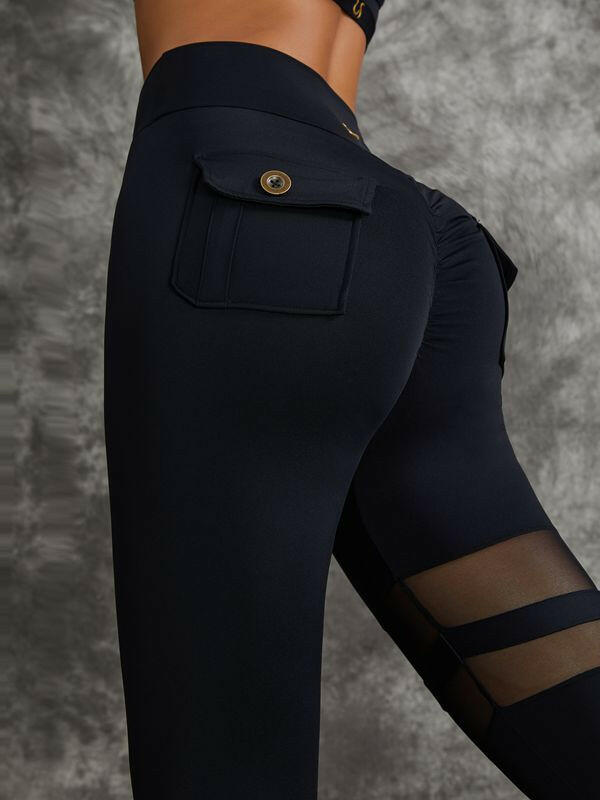 Black Lumina Vancouver sports bra with stylish cut-out design, featuring a supportive fit for active wear.
