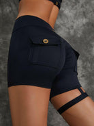 Black Lumina Vancouver sports bra with unique cut-out design, offering stylish support for active wear.