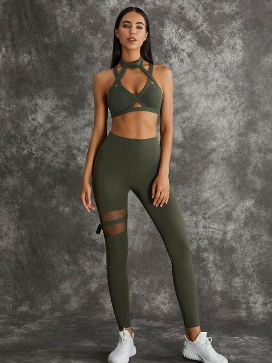 Black Lumina Vancouver sports bra with unique cut-out design, stylish and supportive athletic wear for active women.