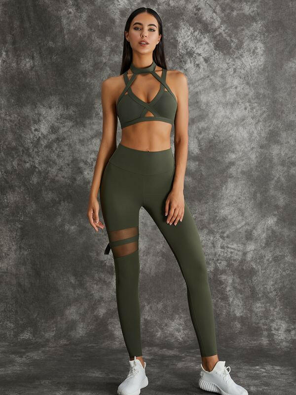 Dark sea green Lumina Vancouver sports bras with unique cut-out design, showcasing stylish and supportive athletic wear.