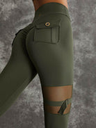 Dark sea green Lumina Vancouver sports bras with unique cut-out design, shown in a bundle for activewear and workout comfort.