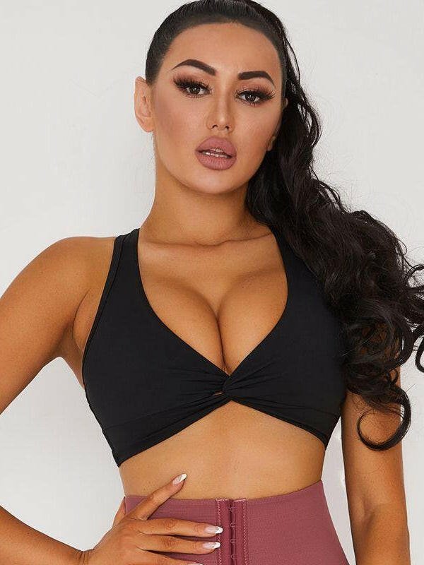 Black Lumina Vancouver V-neck beauty back sports bra with supportive design, ideal for active wear.