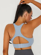 Black Lumina Vancouver V-neck sports bra with a stylish back design, ideal for activewear and comfortable support.