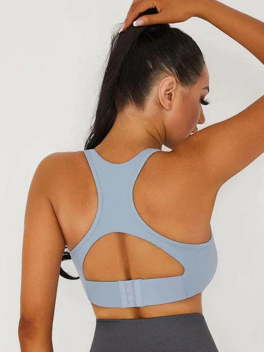 Black Lumina Vancouver V-neck sports bra with a stylish back design, ideal for activewear and comfortable support.