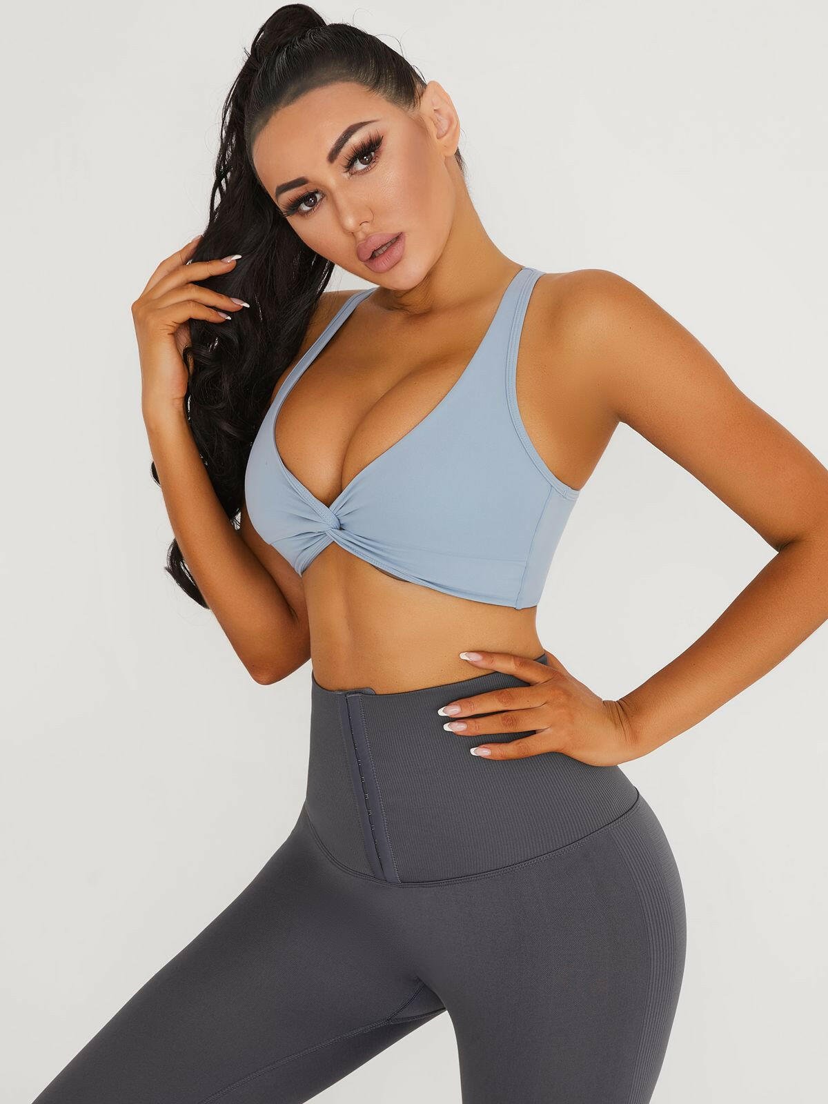 Black Lumina Vancouver V-neck beauty back sports bra with supportive design and stylish fit, ideal for active wear.