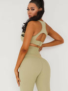 Black Lumina Vancouver V-neck sports bra with a stylish back design, ideal for activewear and comfortable support.