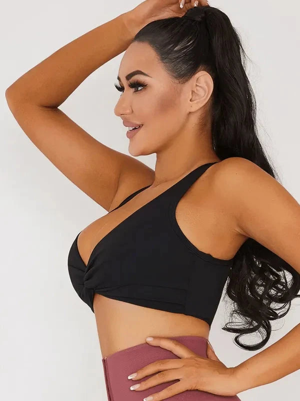 Black Lumina Vancouver V-neck beauty back sports bra with supportive design and stylish look, perfect for active wear.